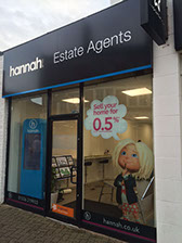 an image showing a shop front sign and window graphic made from alluminium and sprayed black with illuminated letters.Fitted by imagine signs.